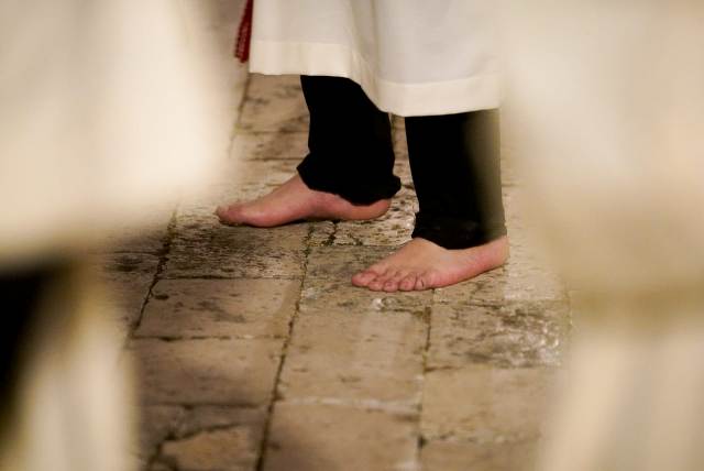 The barefoot cross bearer