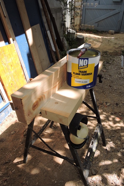 Varnishing the wood base