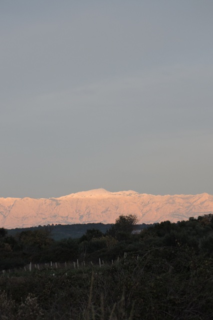 The setting sun illuminates the Dinaric Alps