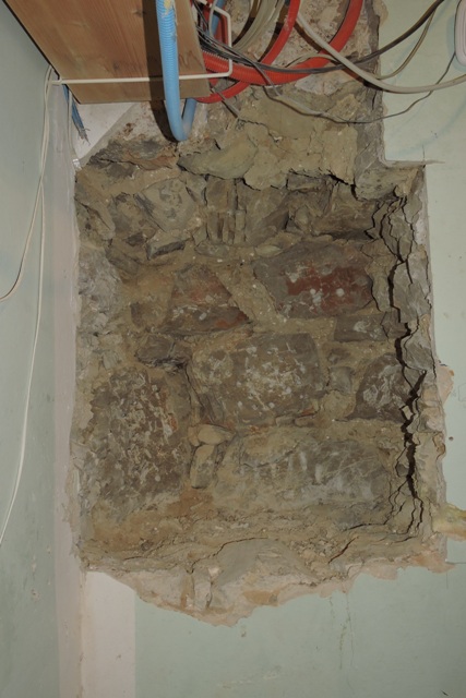 The fully excavated hole in the wall