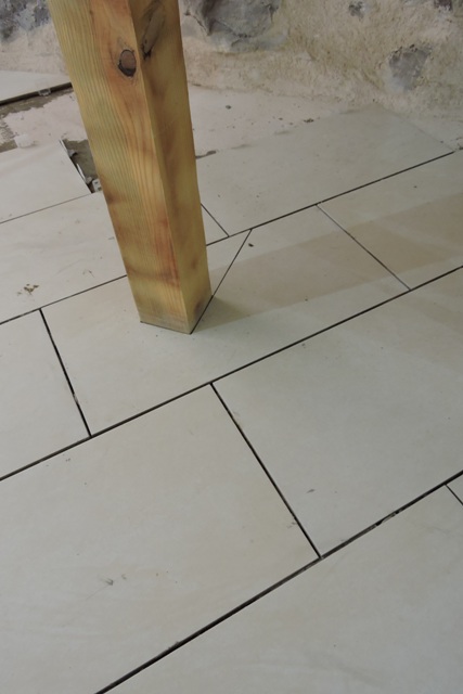 With the tile laid in place