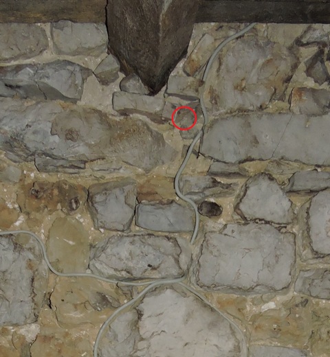Wiring routed in between stone in the walls