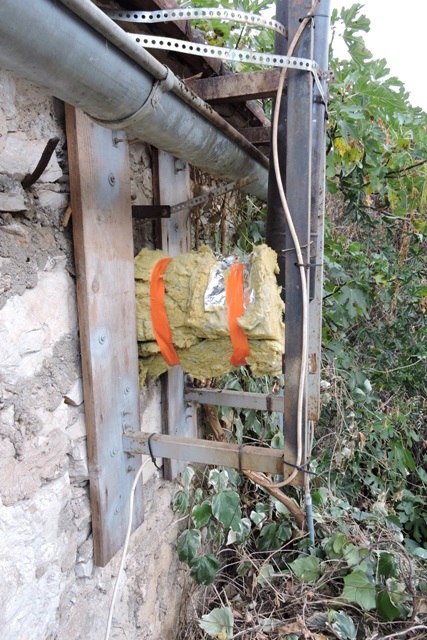 A trial fit of three pieces round the flue pipe