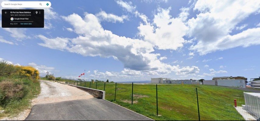 The hospital helipad is on the edge o the town