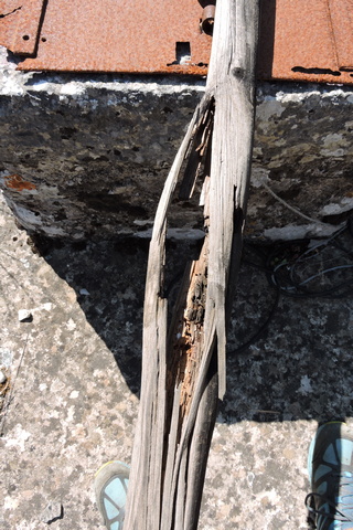 A well rotted horizontal pole