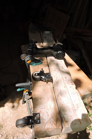 Three castors fitted to each length of timber
