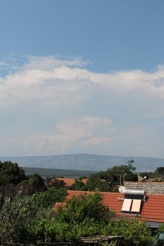 Thunder clouds build over the mainland