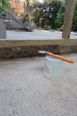Applying the sealant with a brush